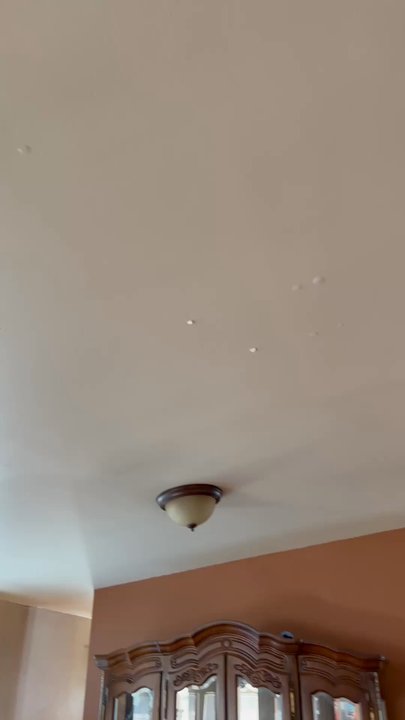 Bone Dry Roofing - Showing where nail heads are showing and sheet rock damage - Roofing Near Me - Fort Collins, Colorado
