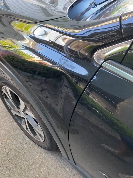 Pao Dent Removal - Before: cratered dent - Mobile Dent Repair Near Me - Georgetown, Texas