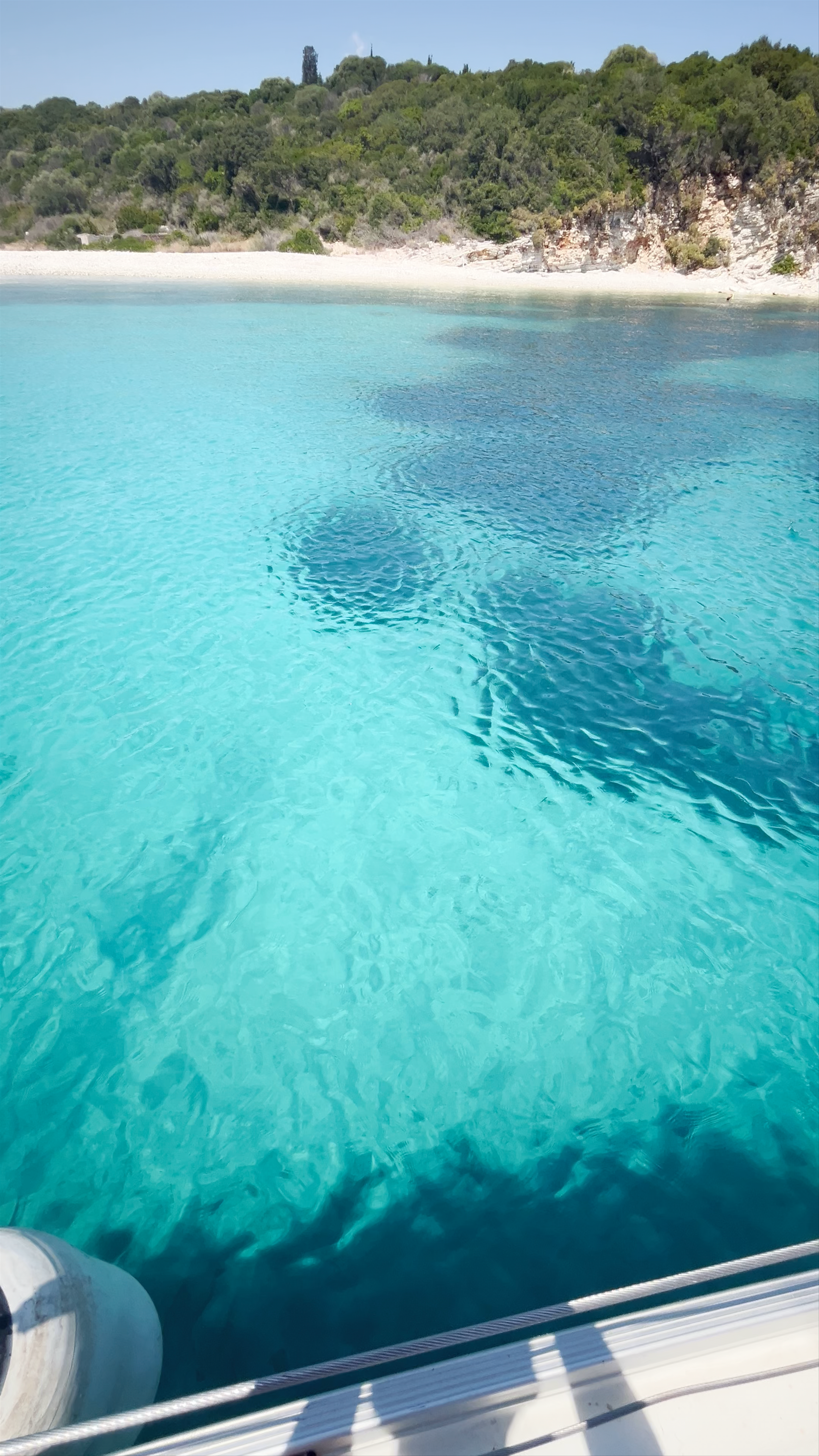 Crystal Clear Waters and Lush Shores of Meganisi, Greece