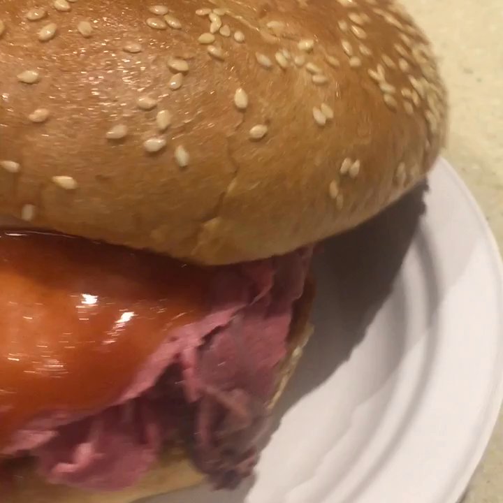 Kelly's Roast Beef - Roast beef, sauce and cheese on a plate in all its glory - Sandwiches Near Me - Medford, Massachusetts