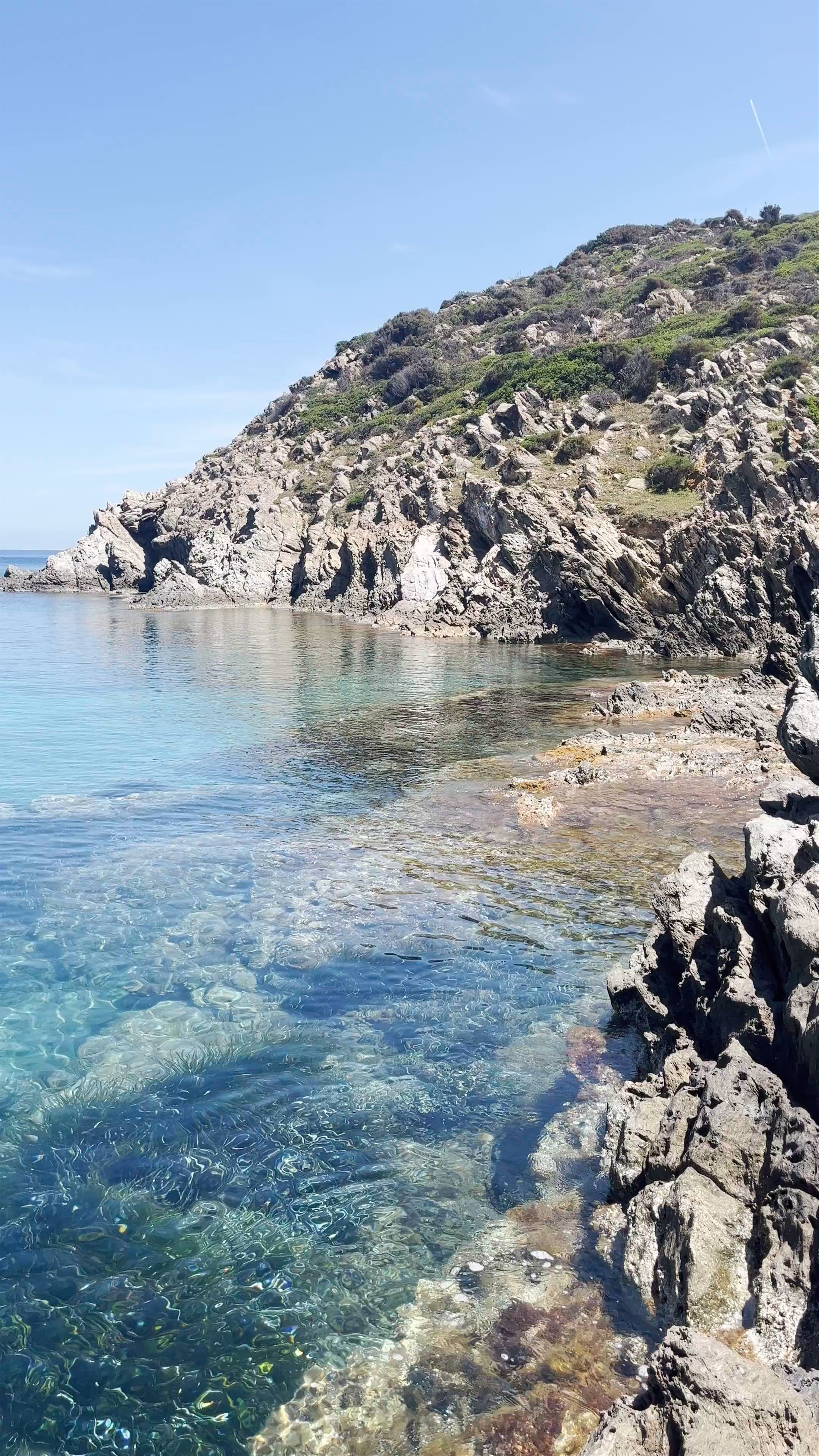 Spiaggia Del Tosatto: Crystal-clear Waters and Rugged Coastal Beauty in Teulada