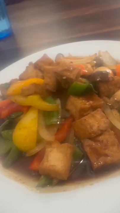 Thai E San - A close an personal look of the spice level three Stit Fry Basil with Tofu - Thai Near Me - Irving, Texas