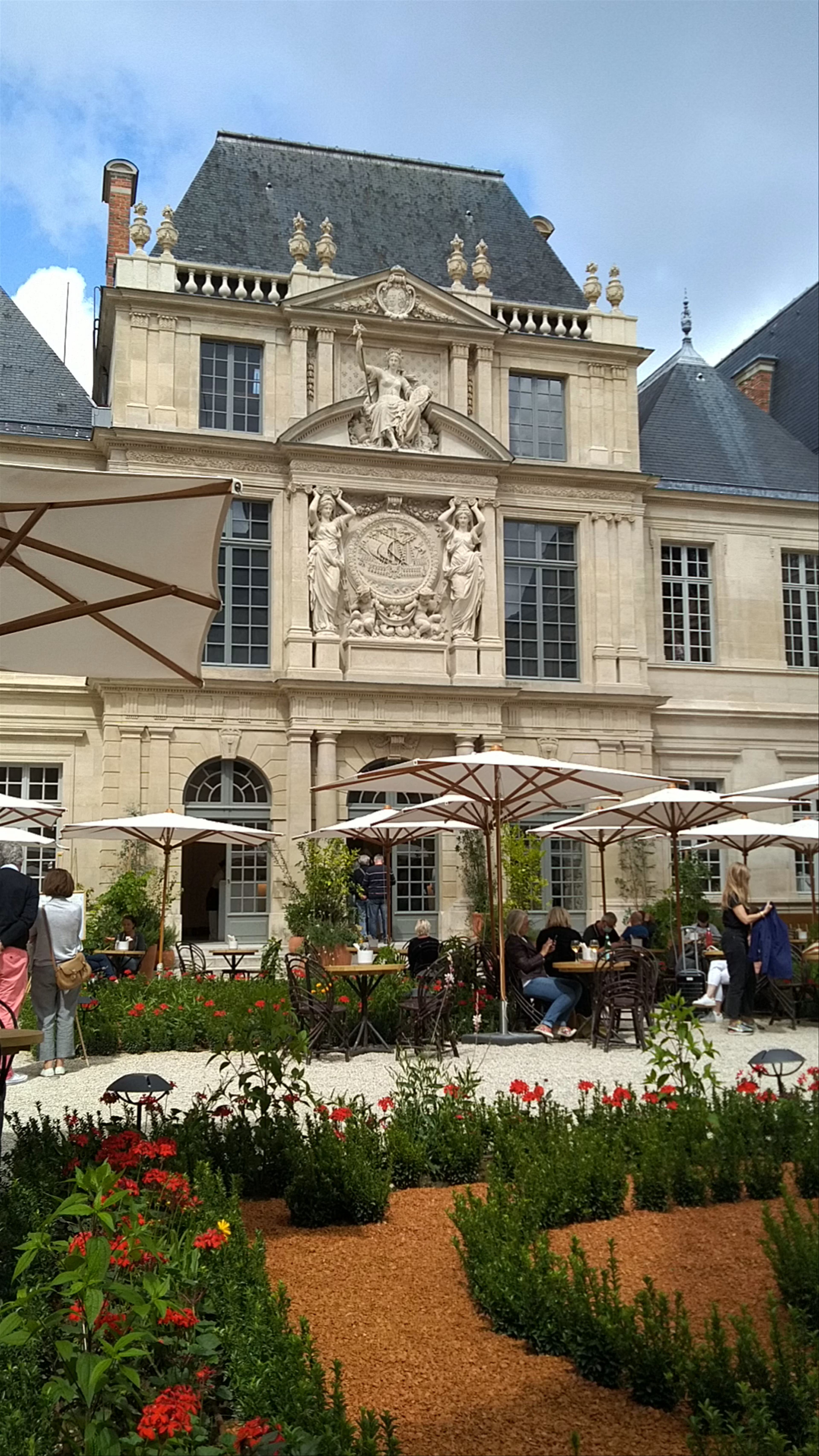 Les Jardins d'Olympe: A Charming Parisian Garden Café Experience