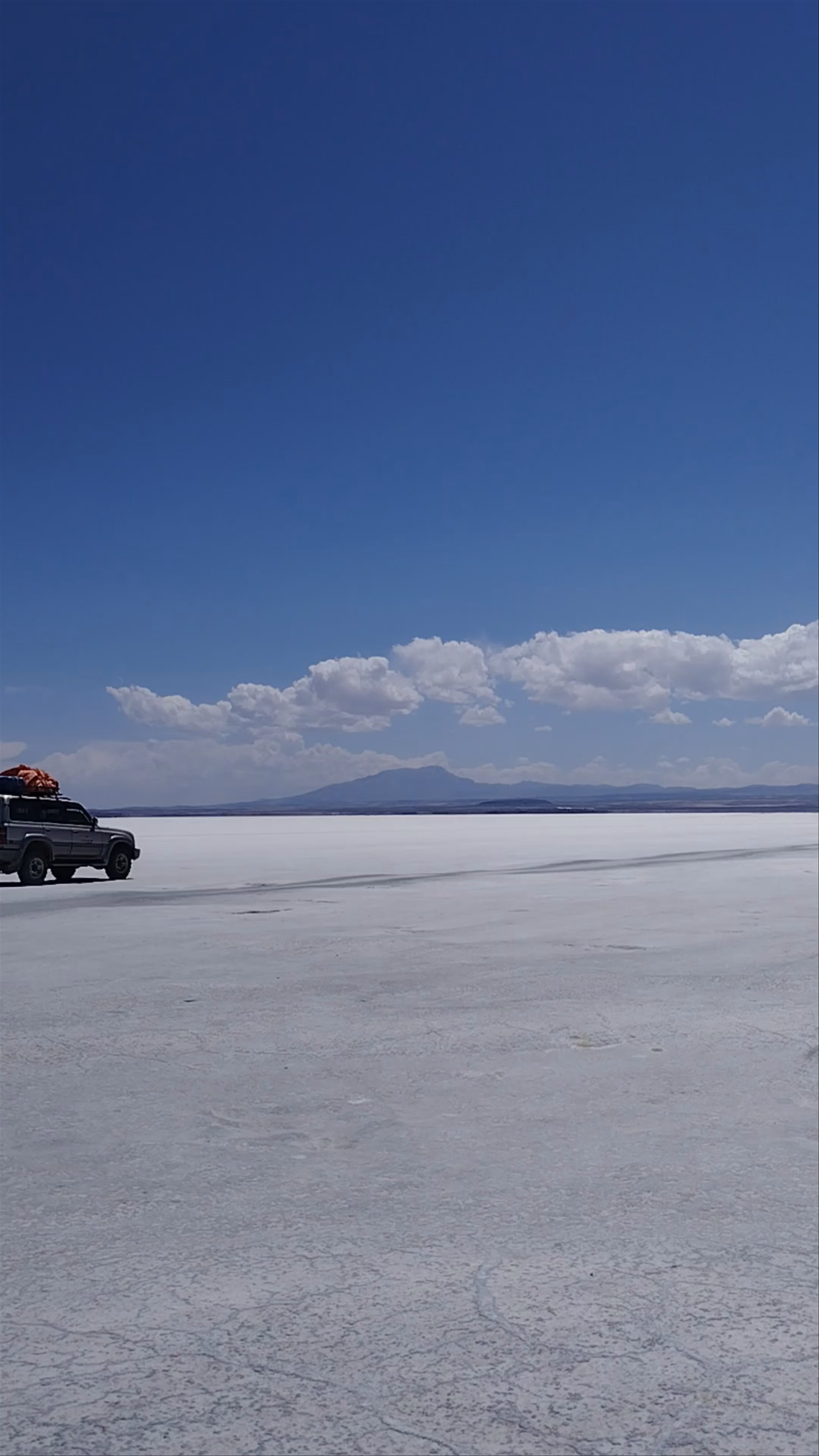 Dakar Monument Adventure at Salar de Uyuni's Vast Expanse