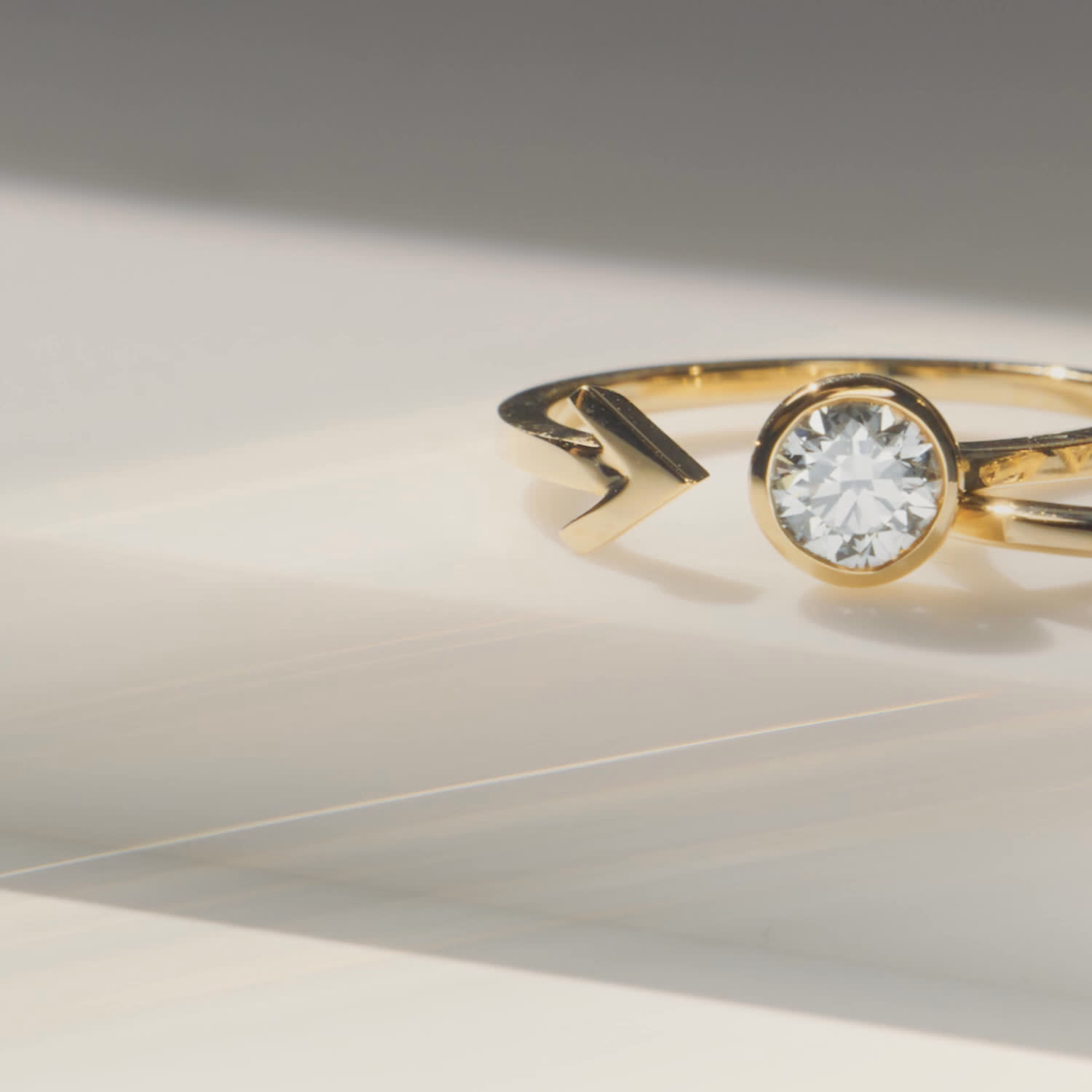 Video of two yellow gold rings on a table