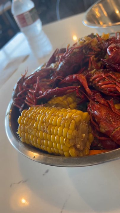 Crawfish Cafe - Crawfish boil 2 lbs of Holy Grail medium spicy and 1lb of lemon pepper medium spicy. Sooo good! - Seafood Near Me - Houston, Texas