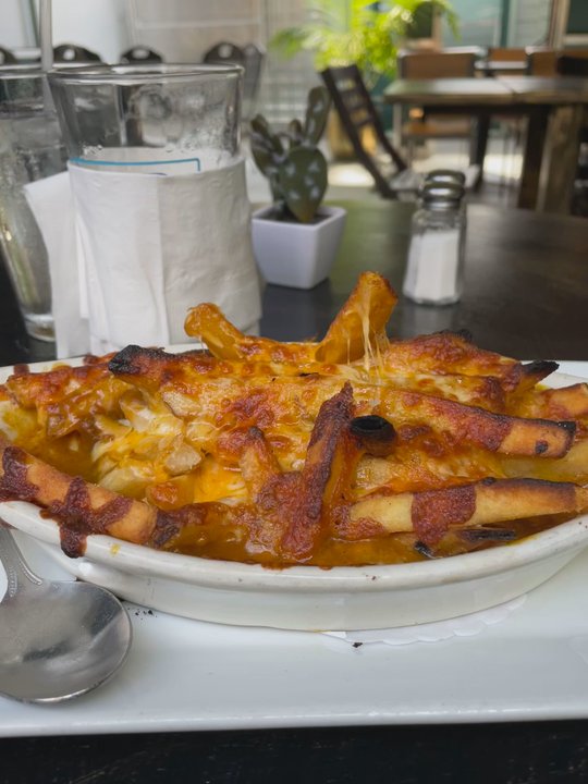 Copper Kettle Bar & Restaurant - piping hot Curry Cheese Fries - Pubs Near Me - Woodside, New York