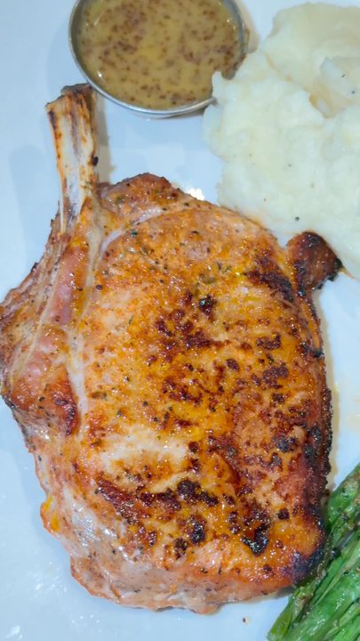 BJ's Restaurant & Brewhouse - Pork chop asparagus and White Cheddar Mashed Potatoes - American Near Me - Concord, California