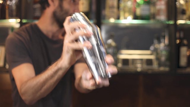 Bartender shaking a cocktail 