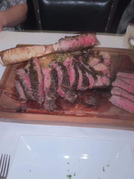 Killens Steakhouse - Left: Wagyu Tomahawk Right: Australian Wagyu Filet - Steakhouses Near Me - Pearland, Texas
