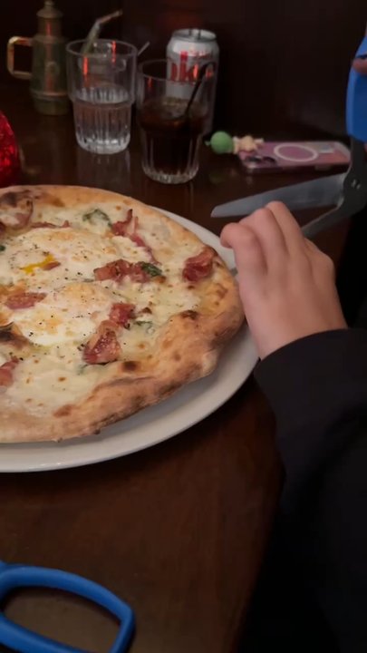 Cornuto Pizzeria - You get scissors to cut the pizza - Italian Near Me - Seattle, Washington