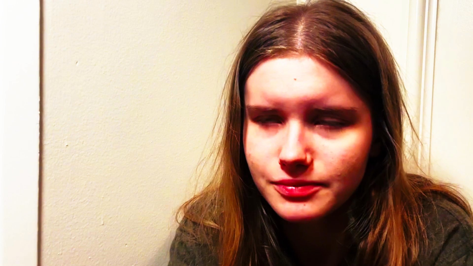 A young woman shares an emotionally intense personal testimony, which is subsequently reviewed by a crisis response operative in a professional communication context.