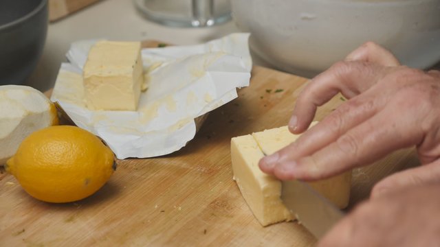 Cutting butter into slices