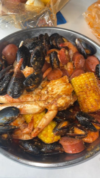 Red Crab - $46 total: 1 cluster of crab legs, 1/2 pound of black mussels, 1/2 pound sausage, 2 corns, 1/2 pound of shrimp no head, and 1/2 potatoes - Seafood Near Me - Spartanburg, South Carolina