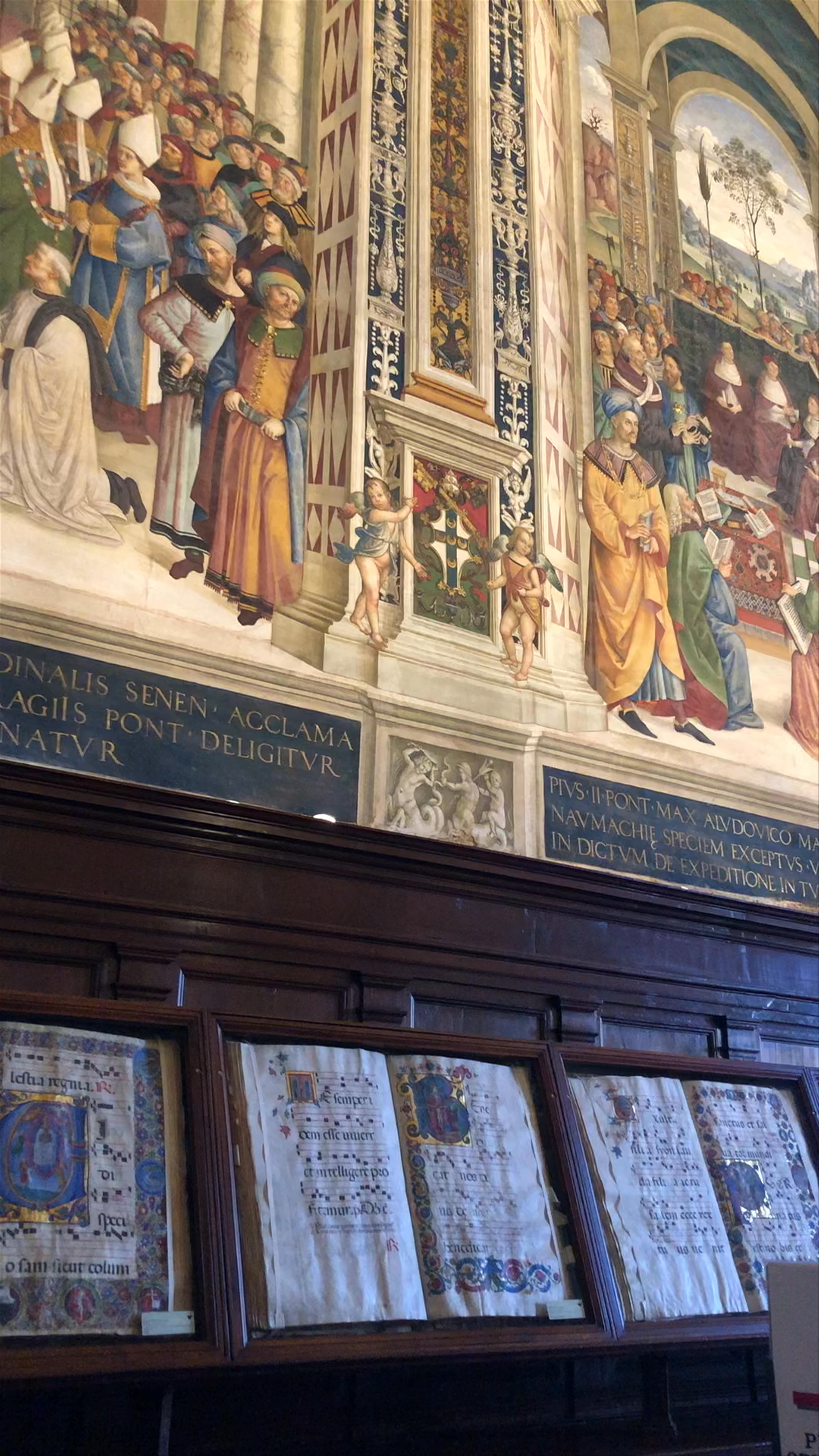 Inside a Historic Fresco-Filled Chamber in Siena, Italy