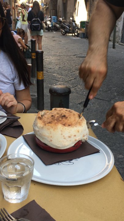 Antica Capri - Opening the baked seafood pasta - Trattorie Near Me - Naples, NA