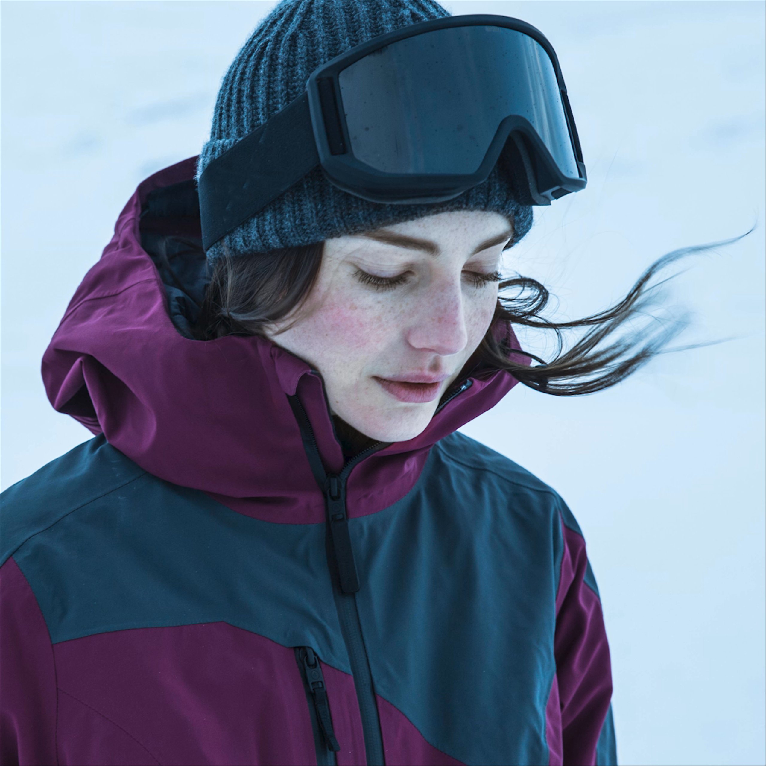 Slideshow of woman wearing Aether gear in various cold-weather locations