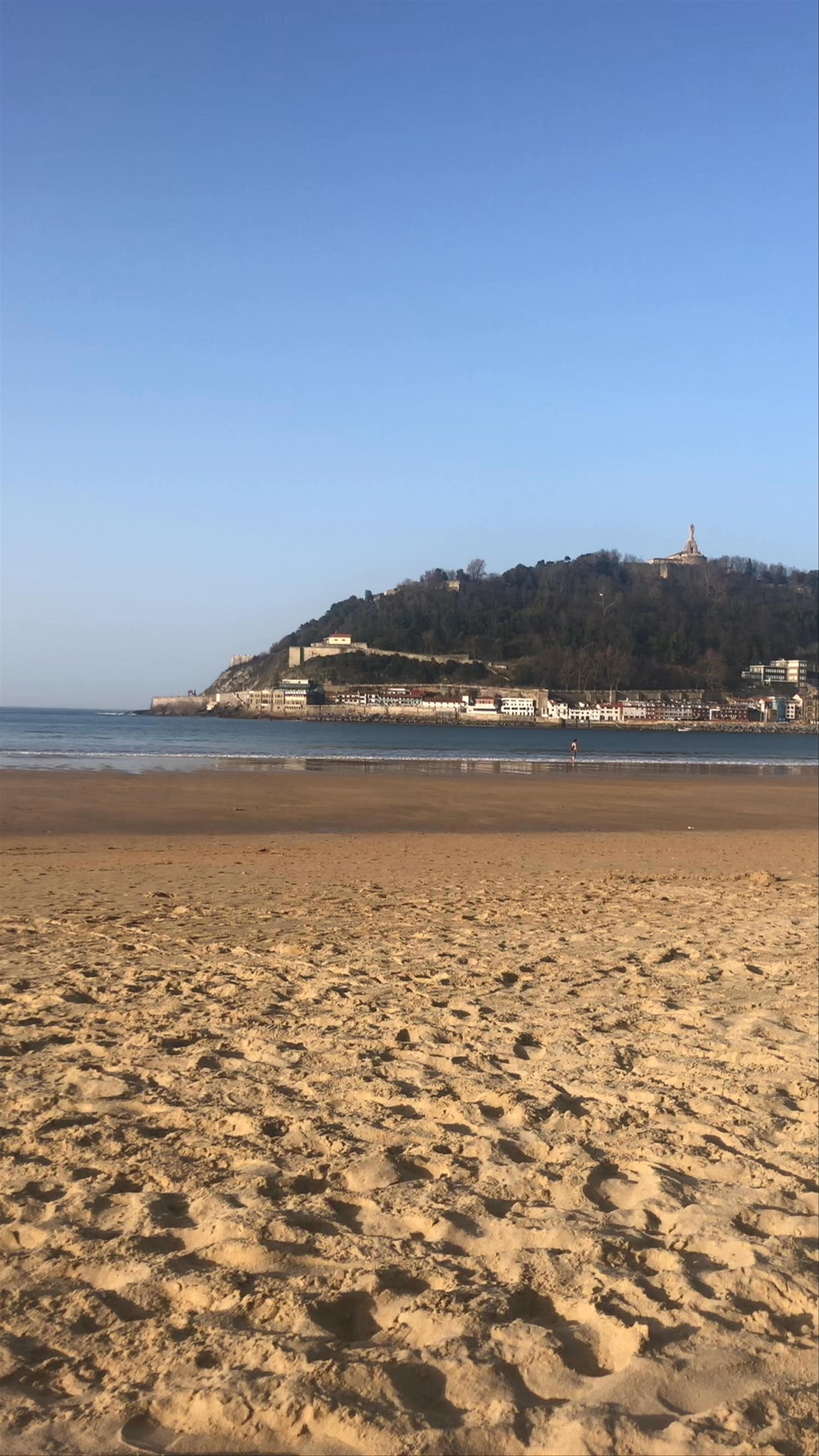 Sunny Stroll Along Playa de la Concha, San Sebastián
