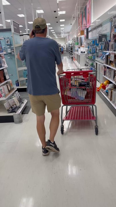 Target - He is stuffing his shopping cart with Pokémon product but there is a 2 per item limit and he knows that. - Department Stores Near Me - Sandy Springs, Georgia