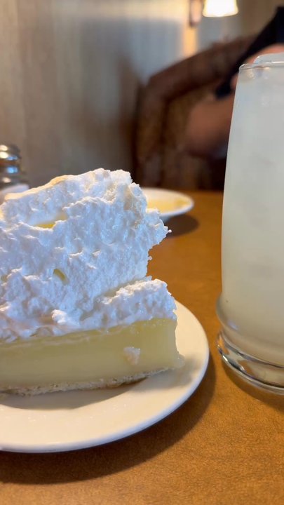 Miss Sheri's Cafeteria - Jiggling the massive lemon meringue pie - American Near Me - Saint Louis, Missouri
