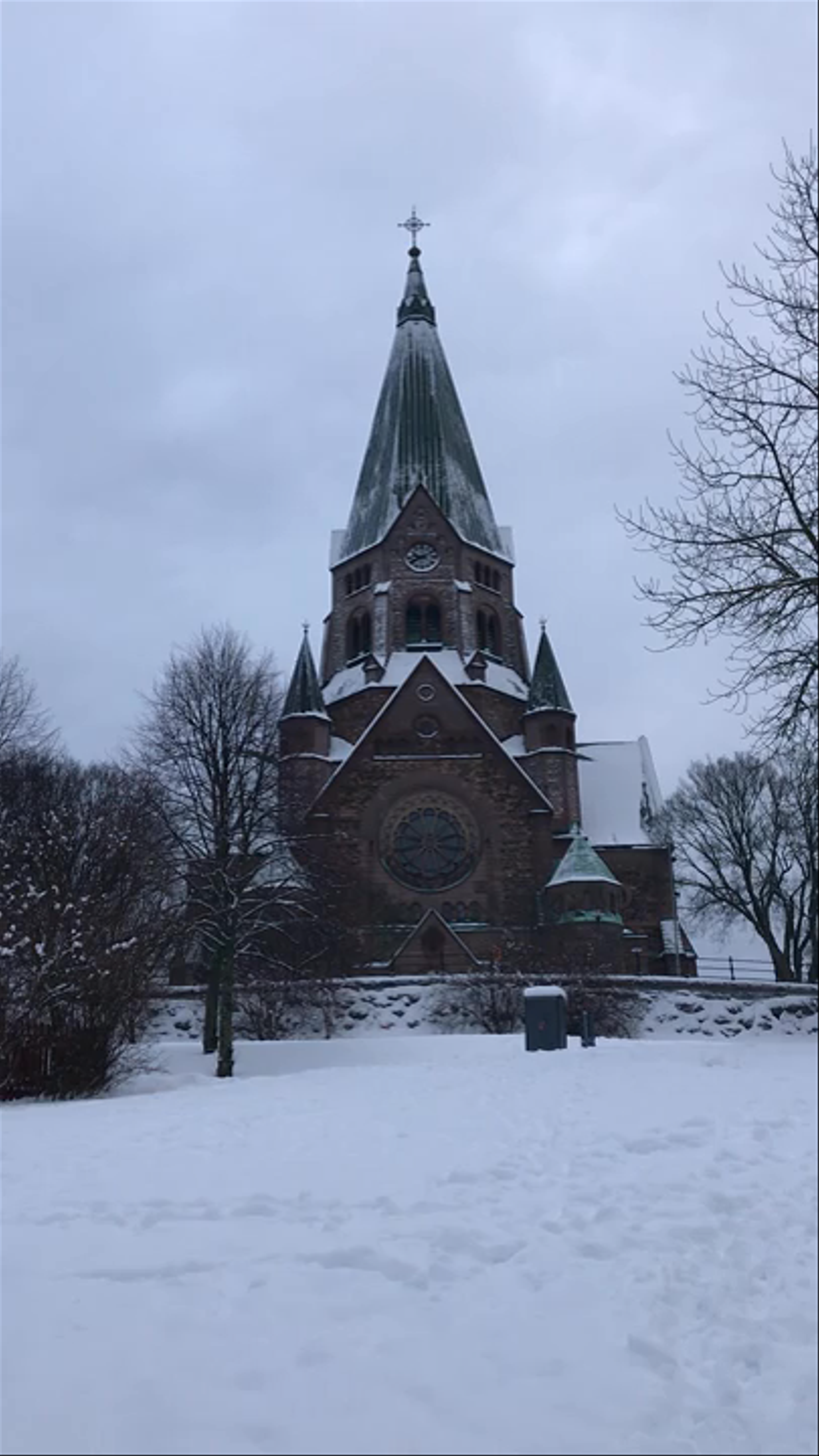 Snow-Covered Church and Winter Park in Stockholm