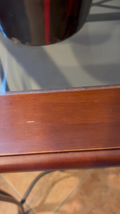 Imperial Cleaning - Showing the dust on one of my end tables (with my friend yelling in the background) - Home Cleaning Near Me - Amityville, New York