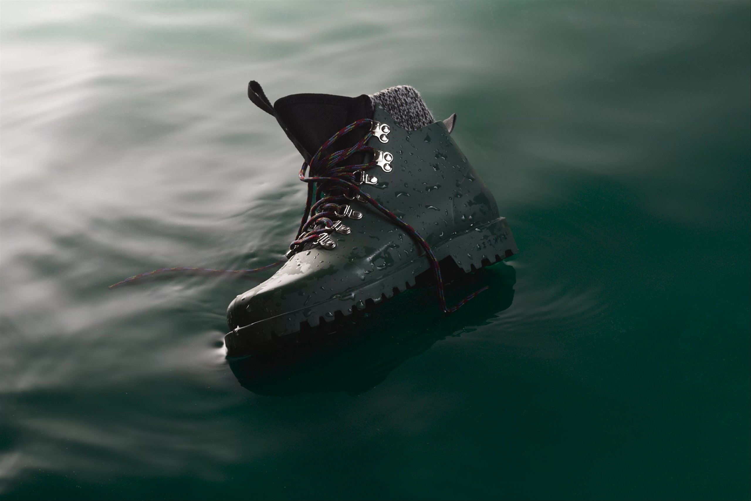 Stop-motion animation of water moving under Rain Boot.