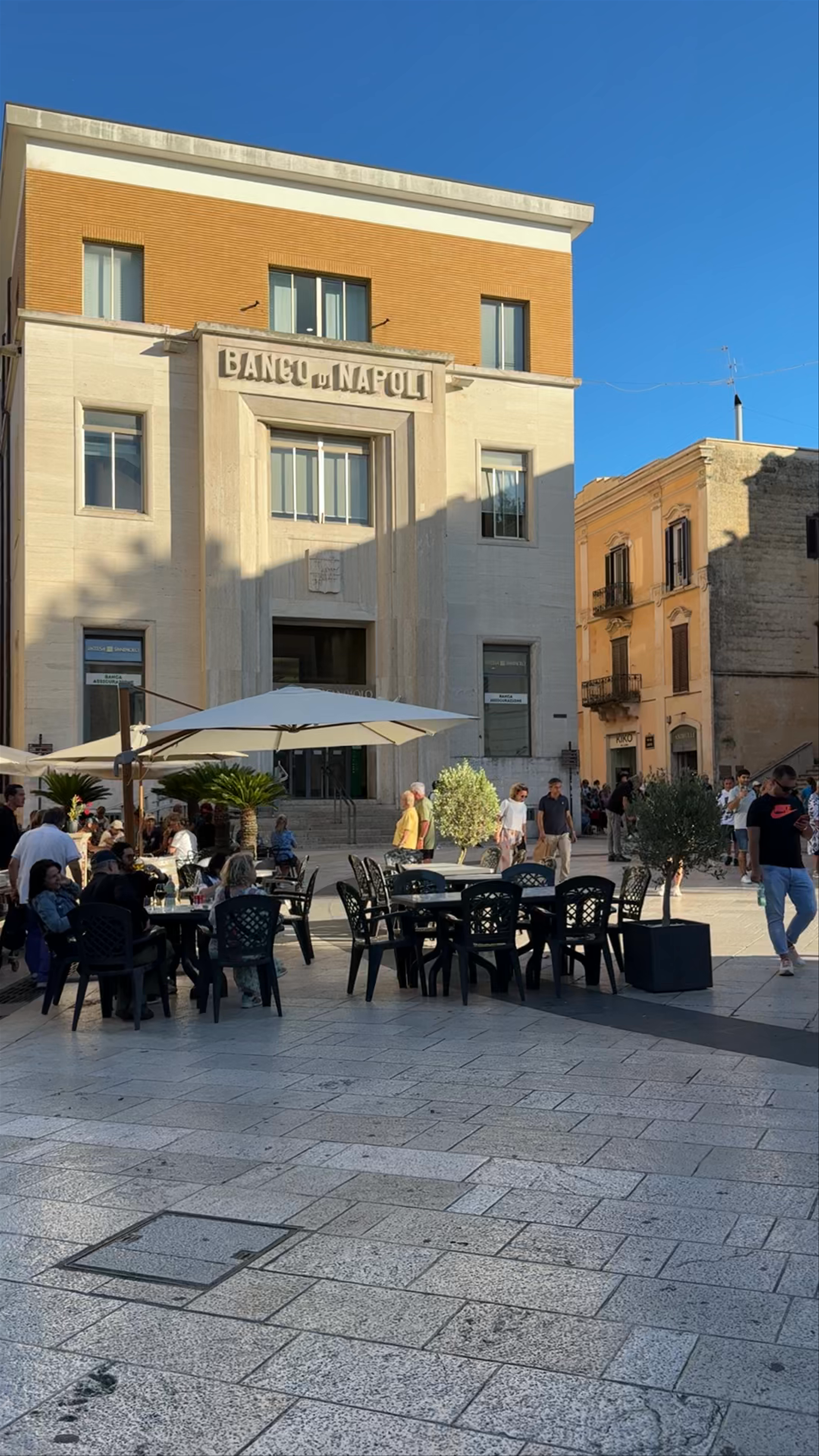 Sunlit Piazza Vittorio Veneto: Charming Social Hub in Matera