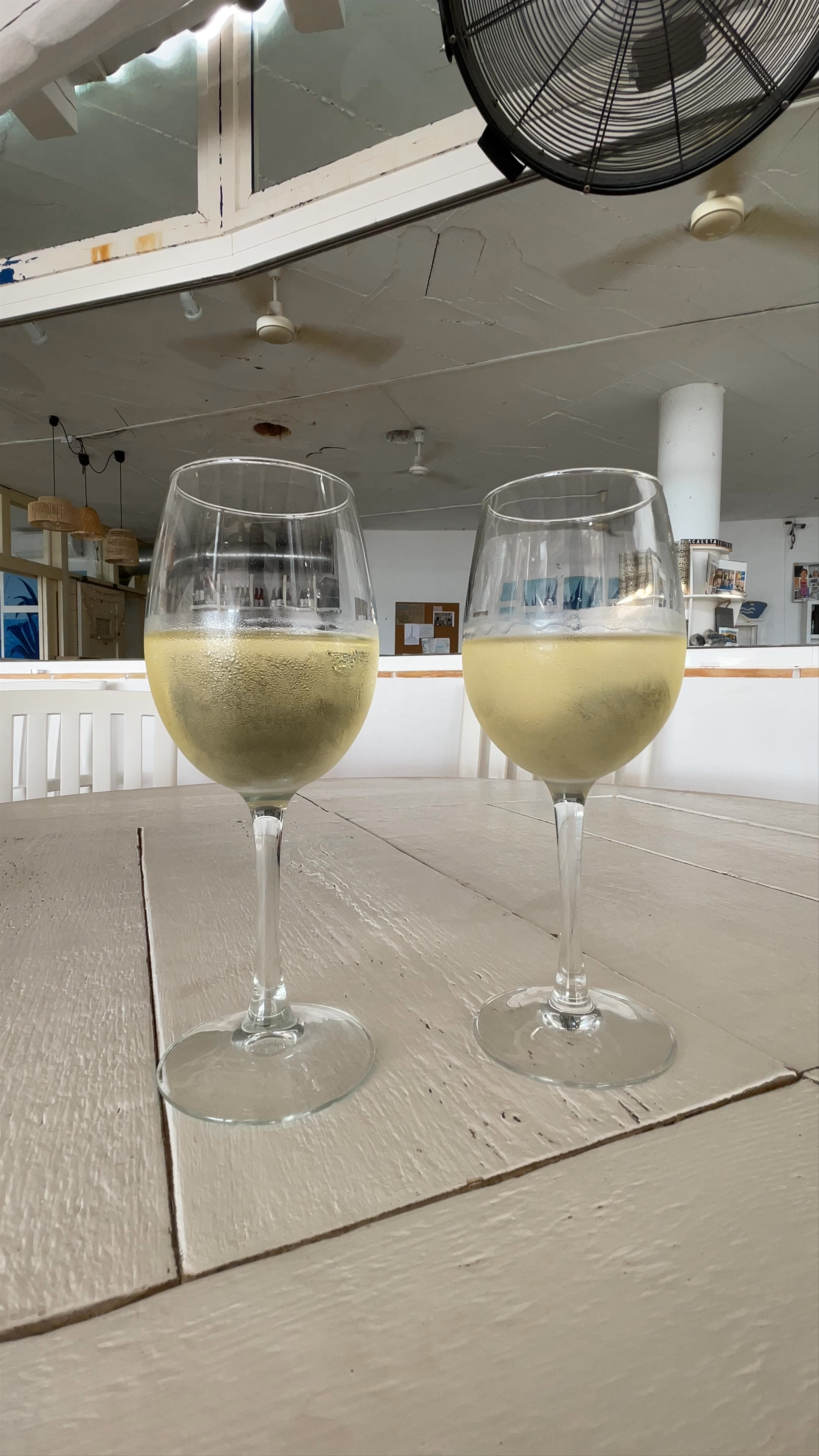Cozy White Wine Moment in La Caleta, Sitges