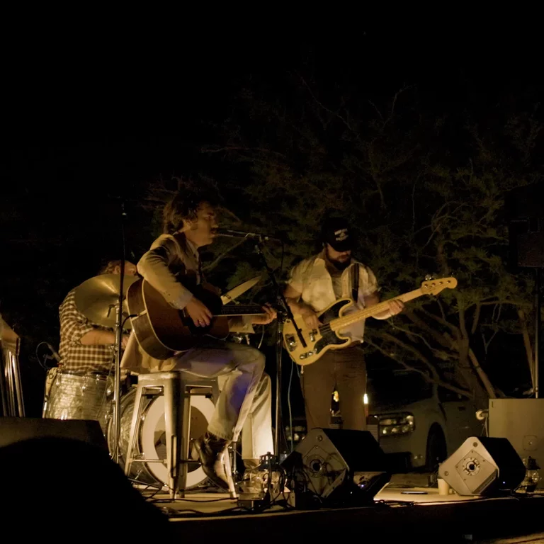 Band playing on stage at night