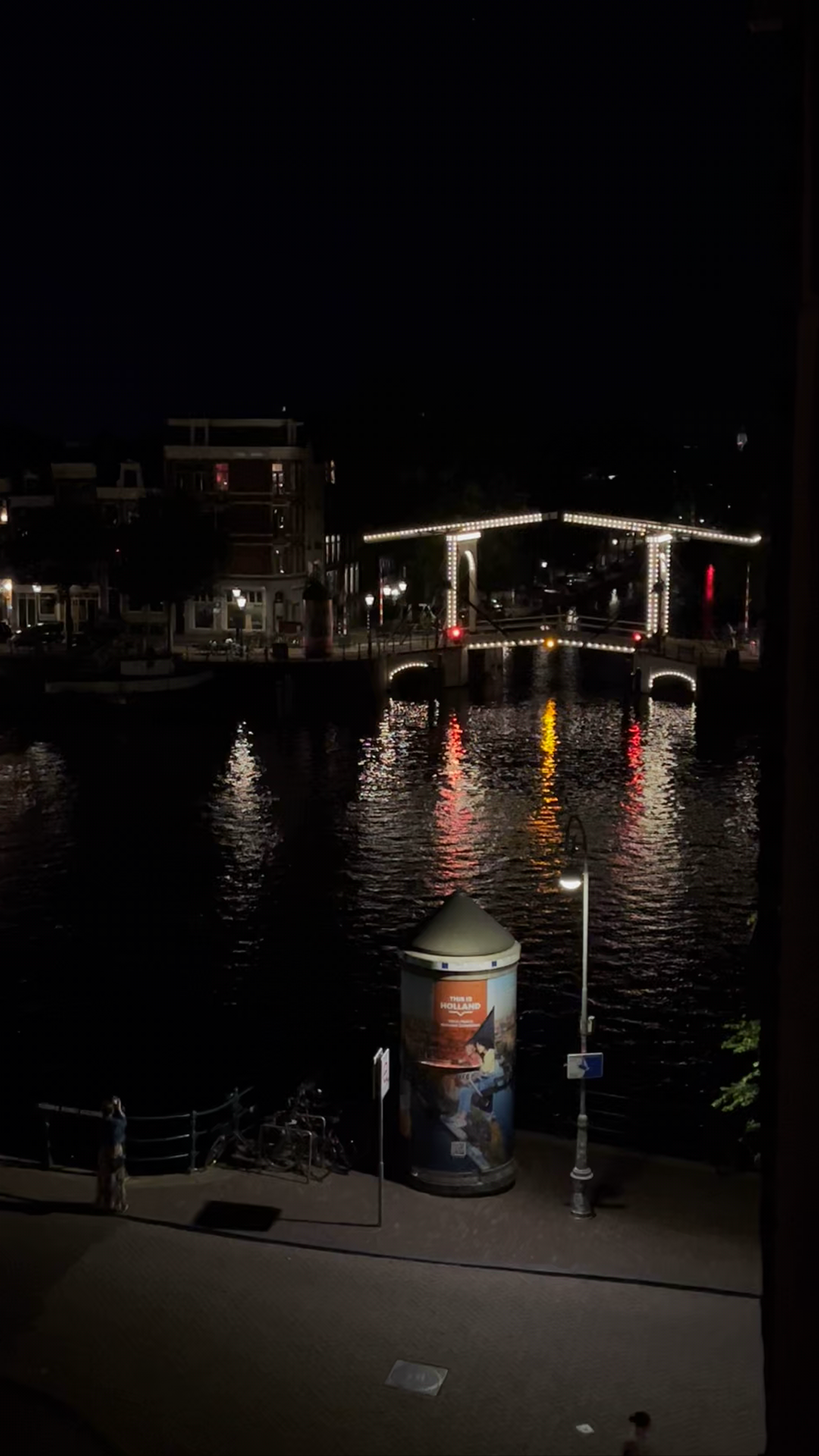 Blauwbrug Bridge Illuminated at Night in Amsterdam