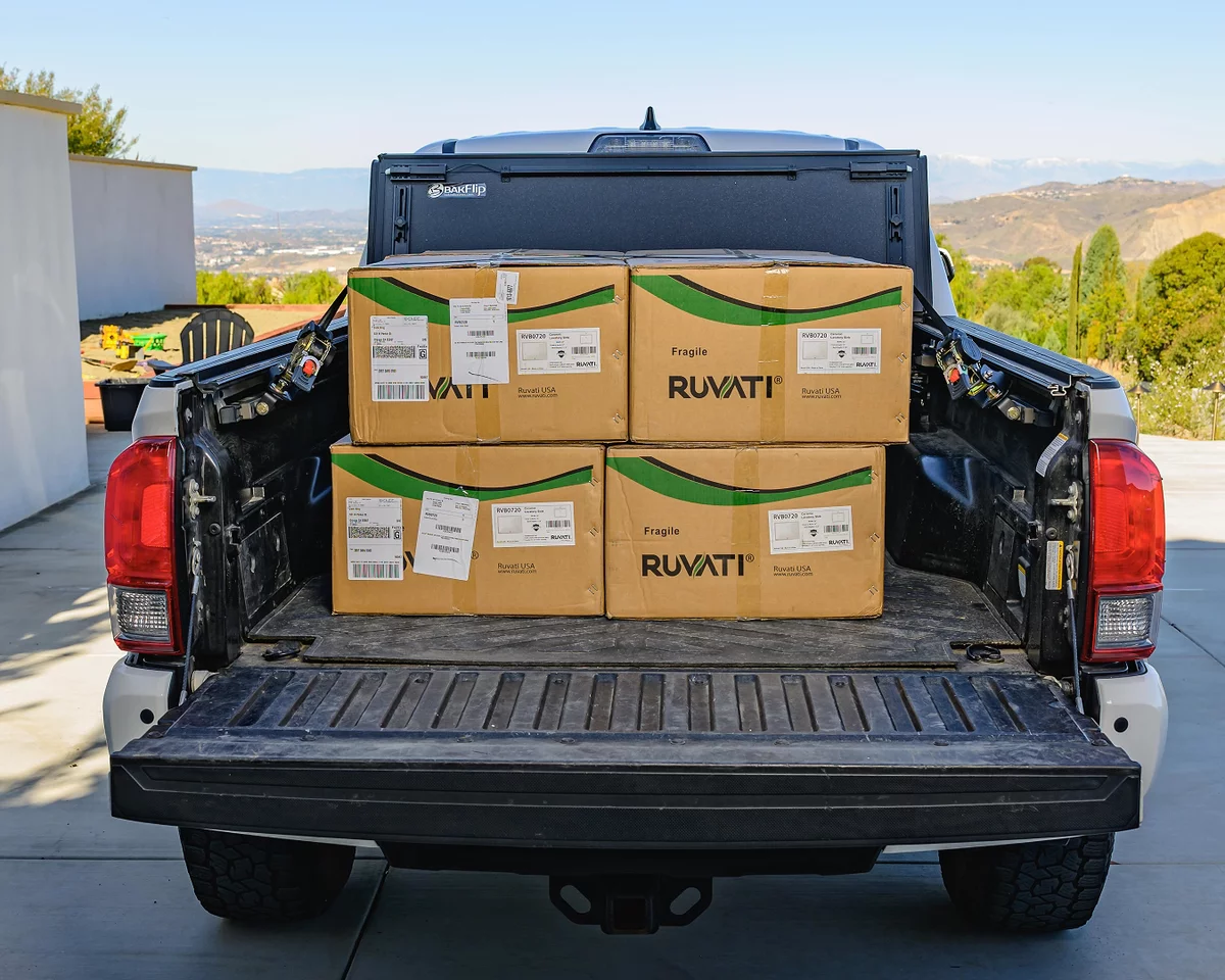 Ultimate Retractable Ratchet Straps® for Toyota Bed Rail in action