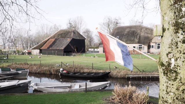 A flag near the canal 