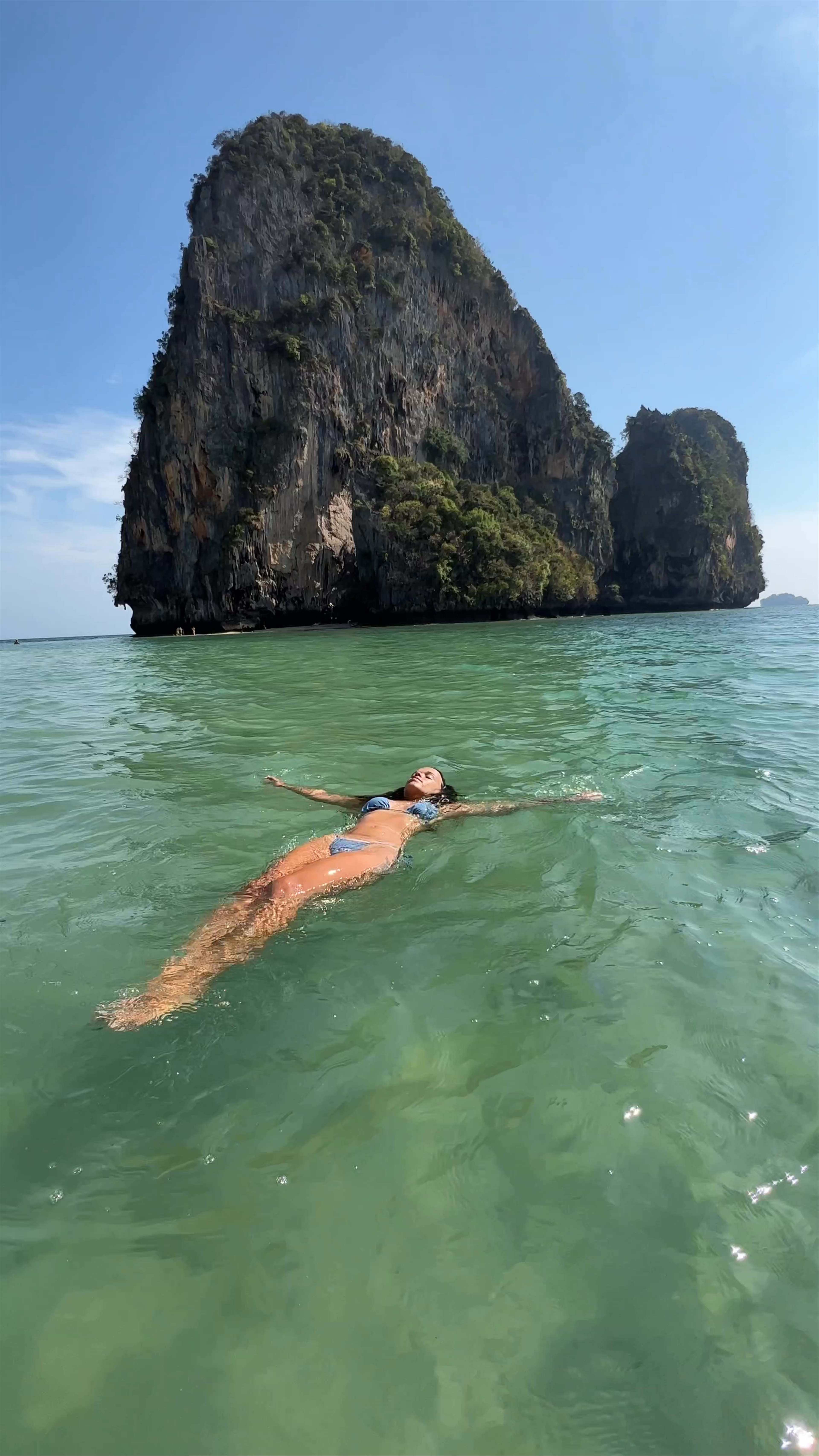 Serene Floating at Phra Nang Cave Beach, Krabi, Thailand