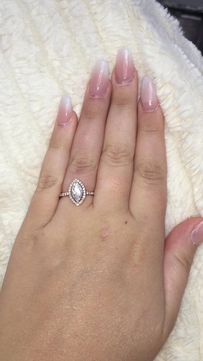 Duff's Fine Jewelry - Beautiful marquise-cut center stone surrounded by gorgeous petite diamonds, set in 14K rose gold. - Jewelry Near Me - Keller, Texas