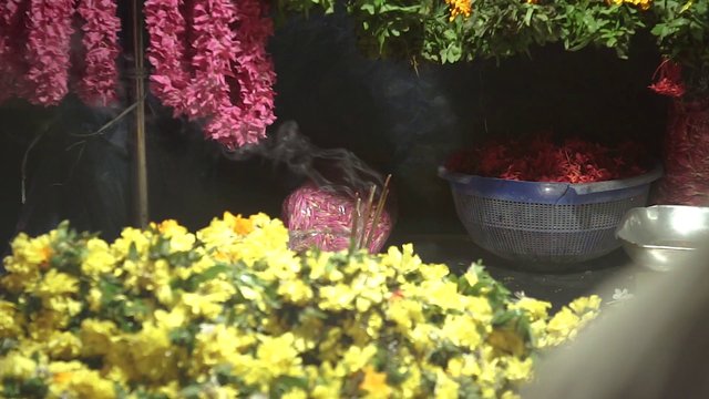 Incense near flowers 