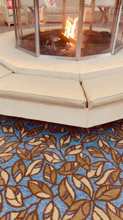 McLean - View of the groovy central fire place for gatherings. - Retirement Homes Near Me - Simsbury, Connecticut