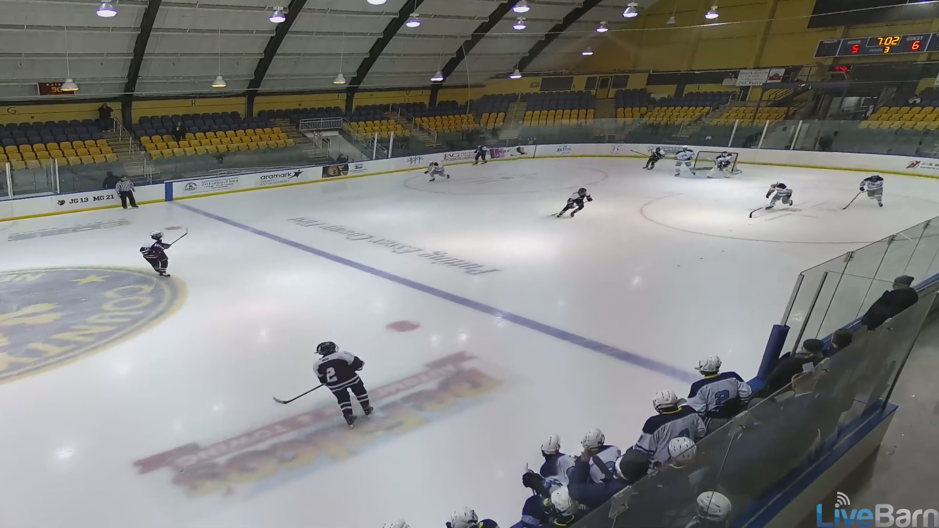 Shot on goal, big check at the other end by #23