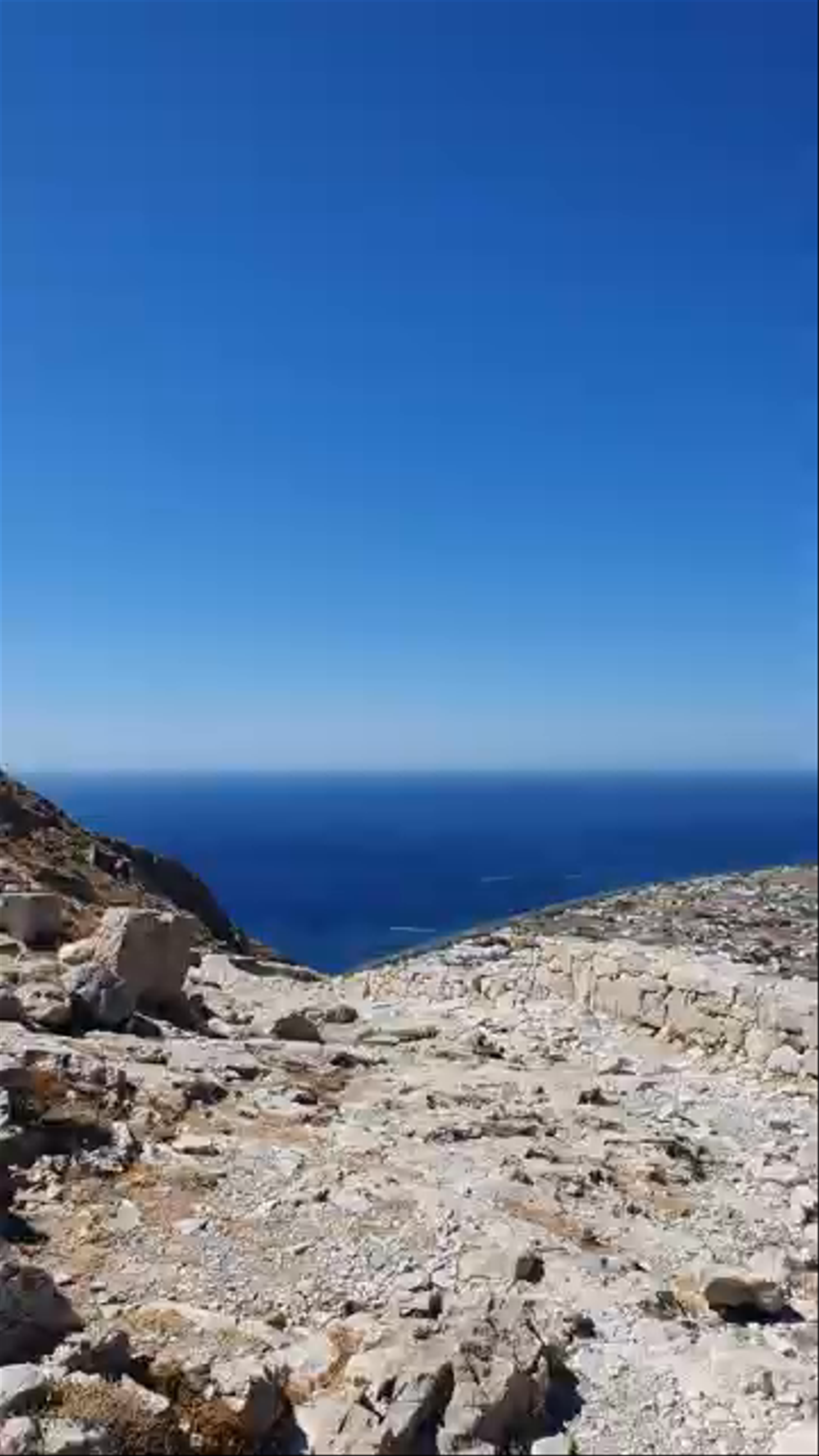 Exploring Ancient Thera: A Sunlit Journey on Santorini's Historic Heights