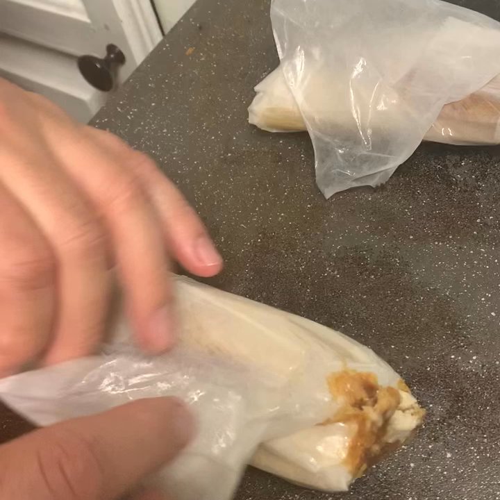 Alondra's Bakery - Unwrapping 2 tamales  puerco and queso - Bakeries Near Me - Azusa, California