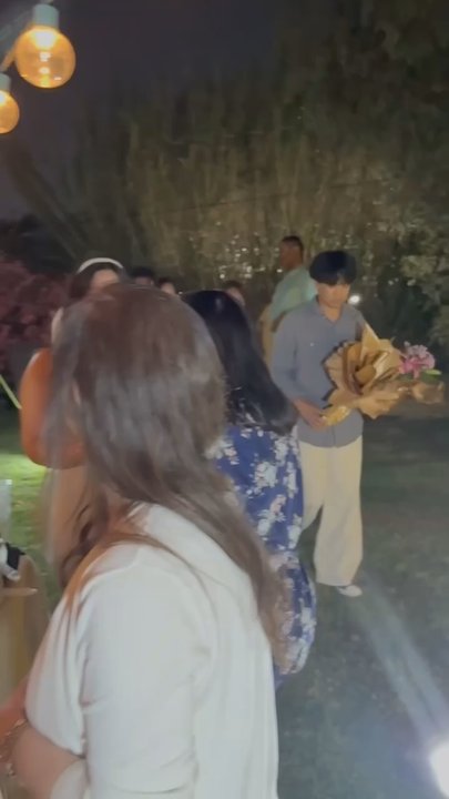 Memo's Gift Shop - That's me in the white pants and blue shirt, carrying the gold-wrapped bouquet--flowers for the wedding and Mother's Day. - Florists Near Me - La Habra, California