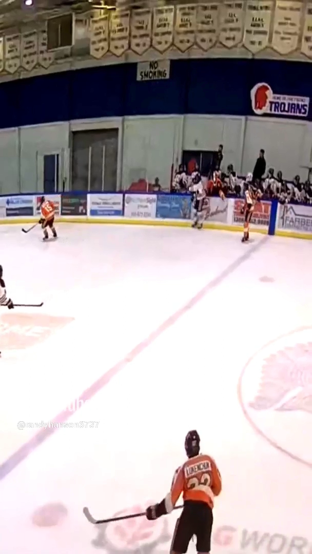 Tristan Hanson Delivers a Check for Tisdale Trojans U18 AAA