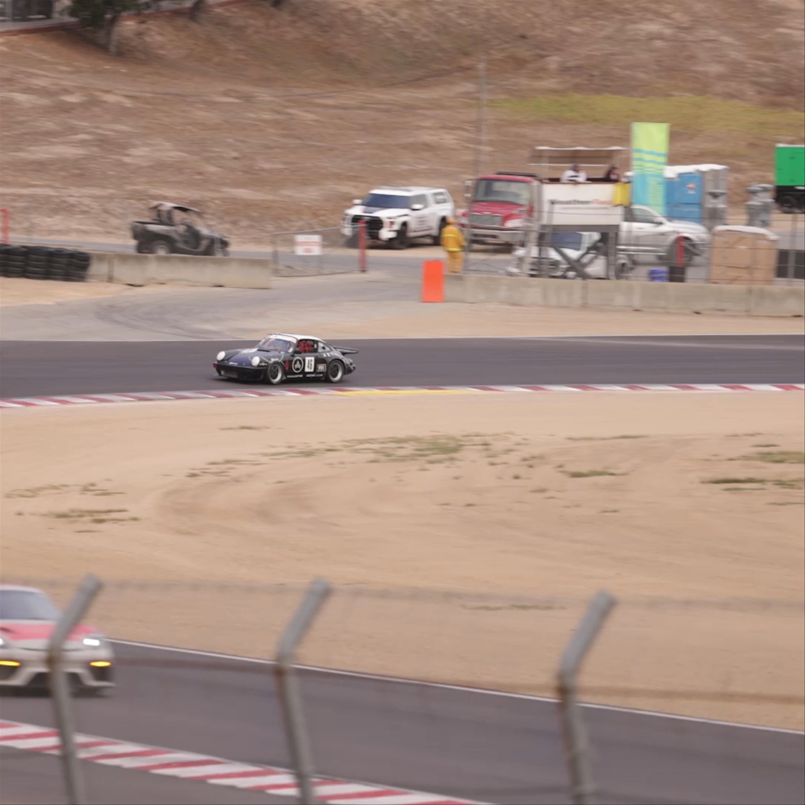 Vintage Porsche cars driving on Rennsport track