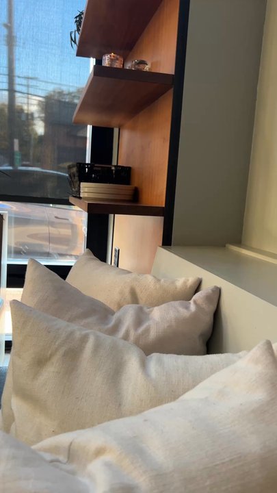 Zhug - Pillows on the benches make everything feel elevated and cozy. - Mediterranean Near Me - Cleveland Heights, Ohio