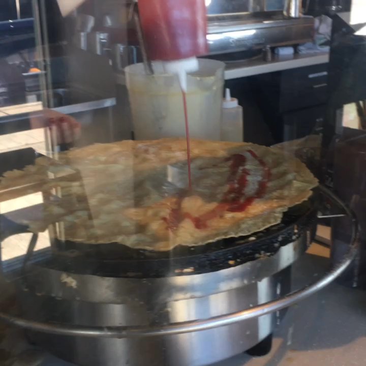 Leonidas Chocolate Cafe - Nutella crepe in the making - Chocolatiers & Shops Near Me - Northbrook, Illinois