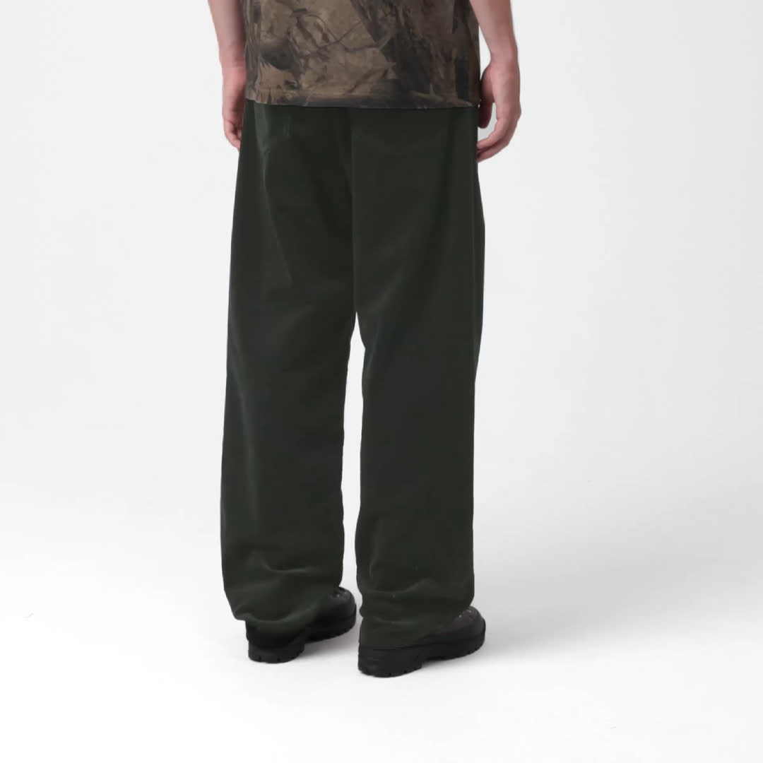 Model wearing a pair of Landon Pants in Raven