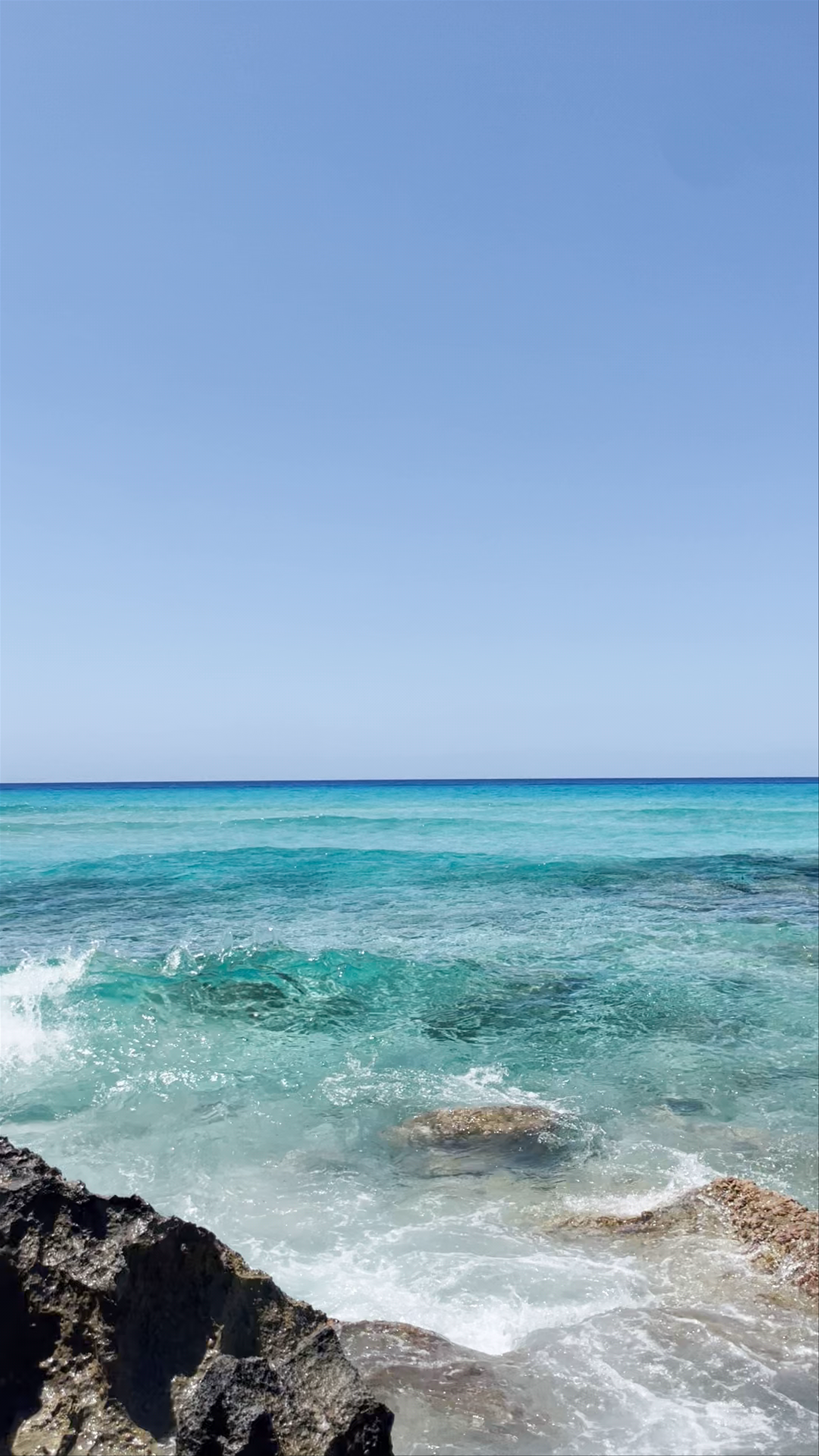 Turquoise Waves and Rocky Shores of Formentera