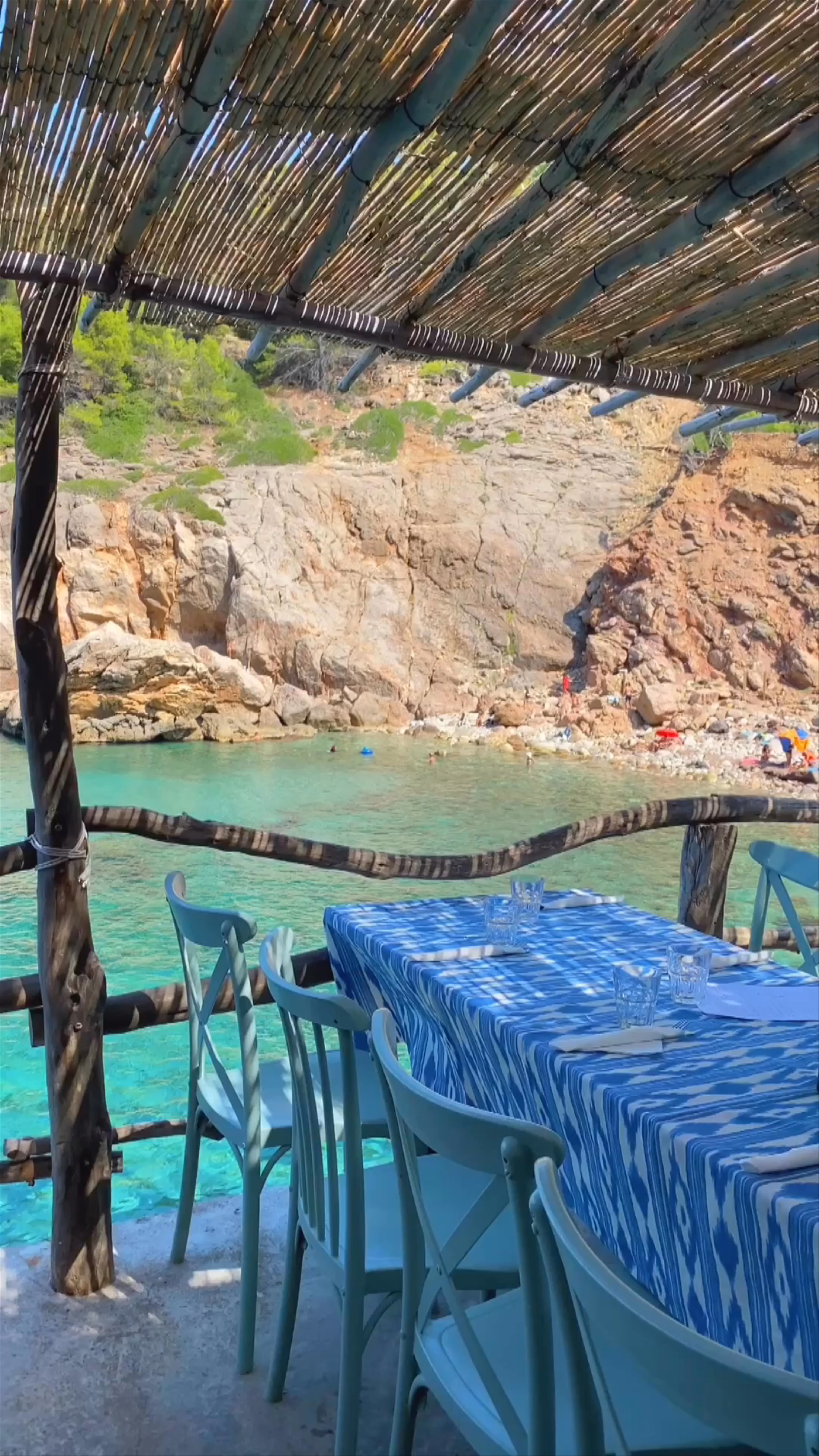 Ca's Patró March: Seaside Dining with Crystal Clear Waters in Deià, Spain