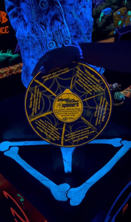 Monster Mini Golf Frisco - Spinning the wheel to determine how to start this section of the game - Mini Golf Near Me - Frisco, Texas