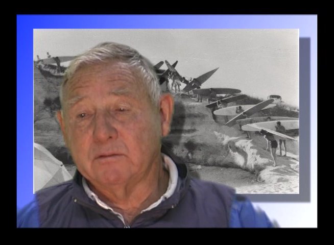 An elderly man provides a personal account of historical wartime events while vintage archival footage is superimposed behind him. He shares his experiences, reflecting on the gravity of past military engagements.